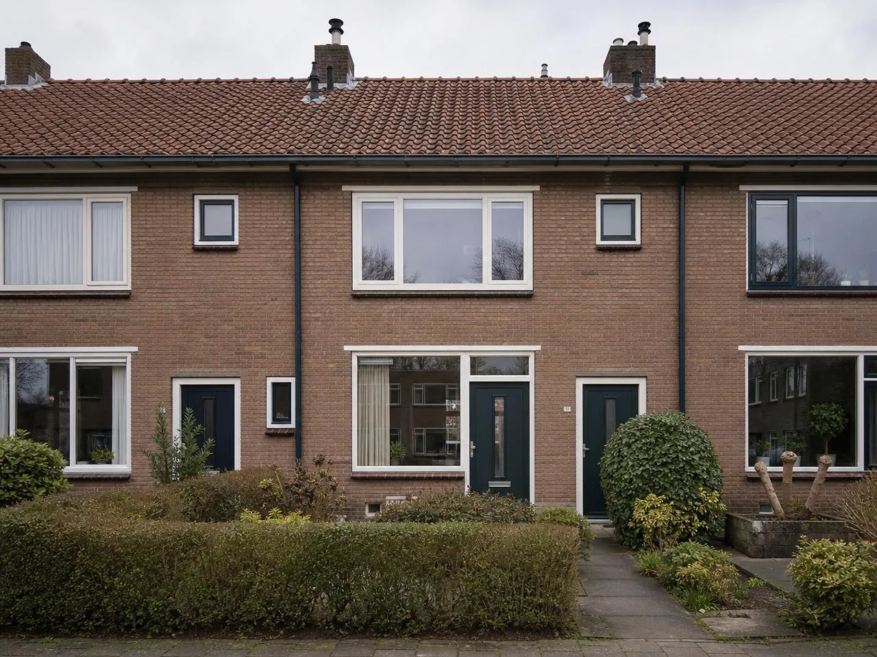 Jaren '80 tussenwoning Amersfoort, bruine baksteen, pannendak